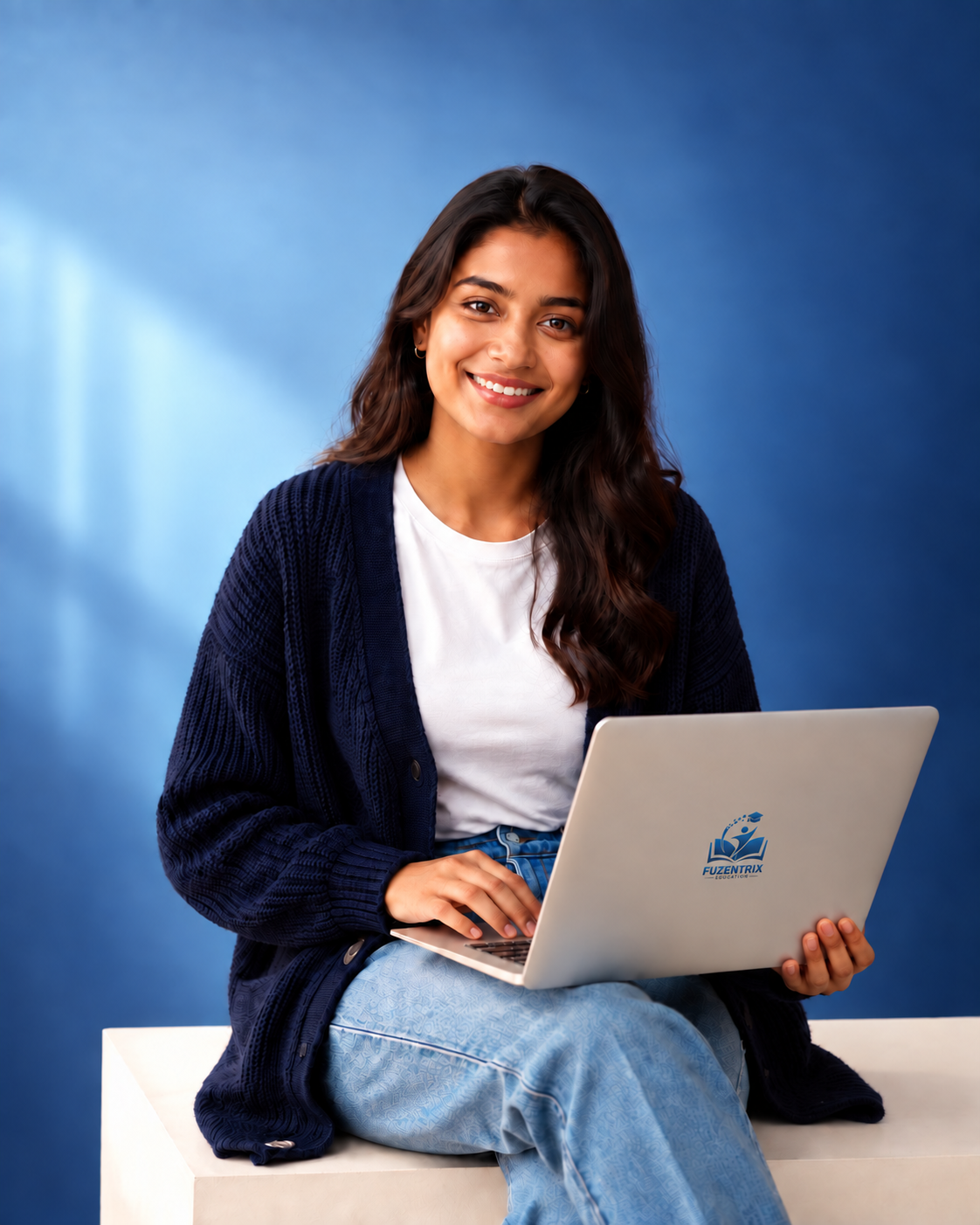A smiling student learning with her laptop